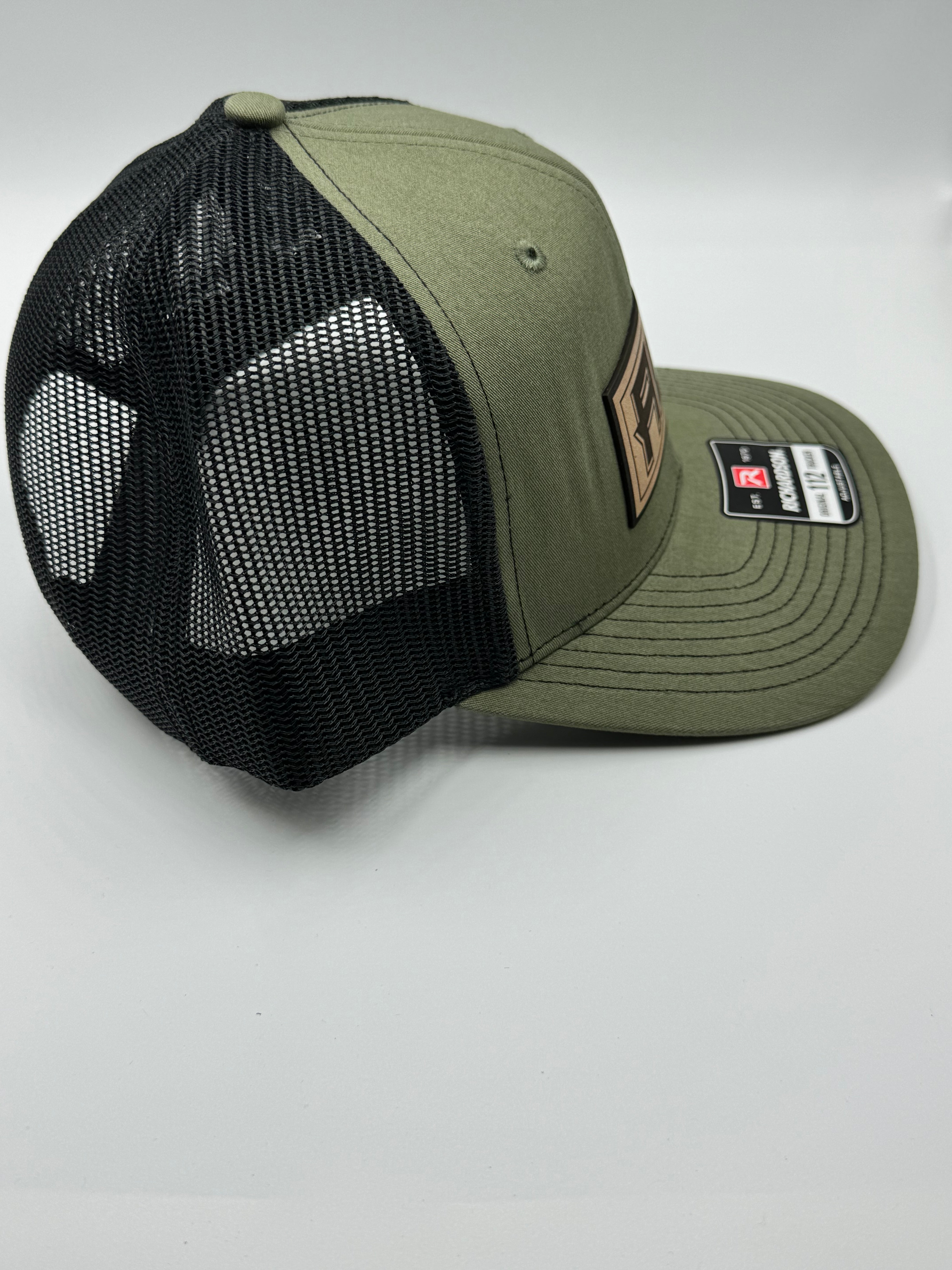 Green/Black Hat With Leather Patch