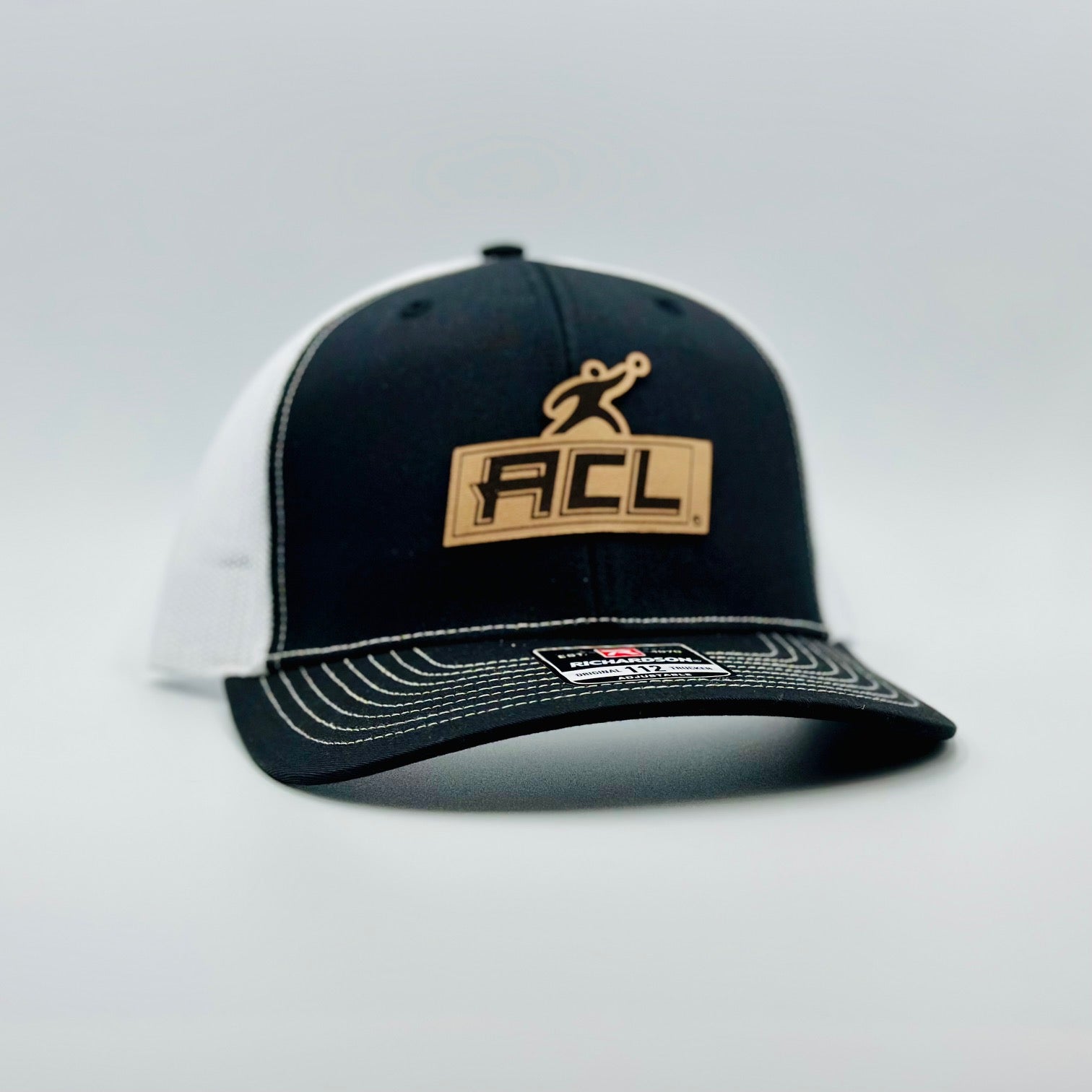 Black/White Hat With Leather Patch