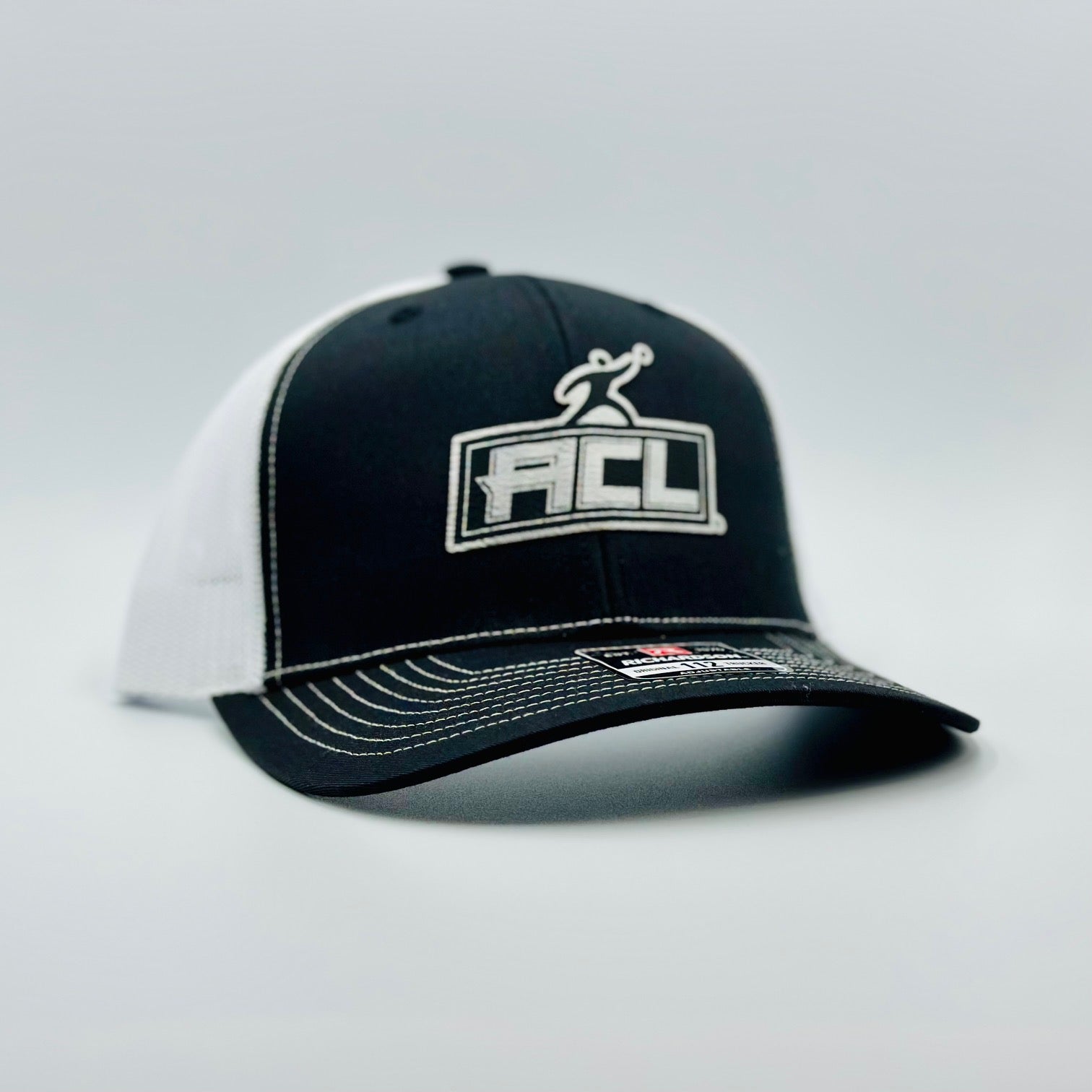 Black/White Hat With Sliver Patch