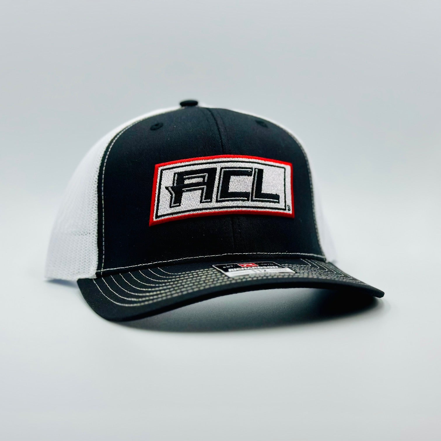 Black/White Hat With Stitched Patch