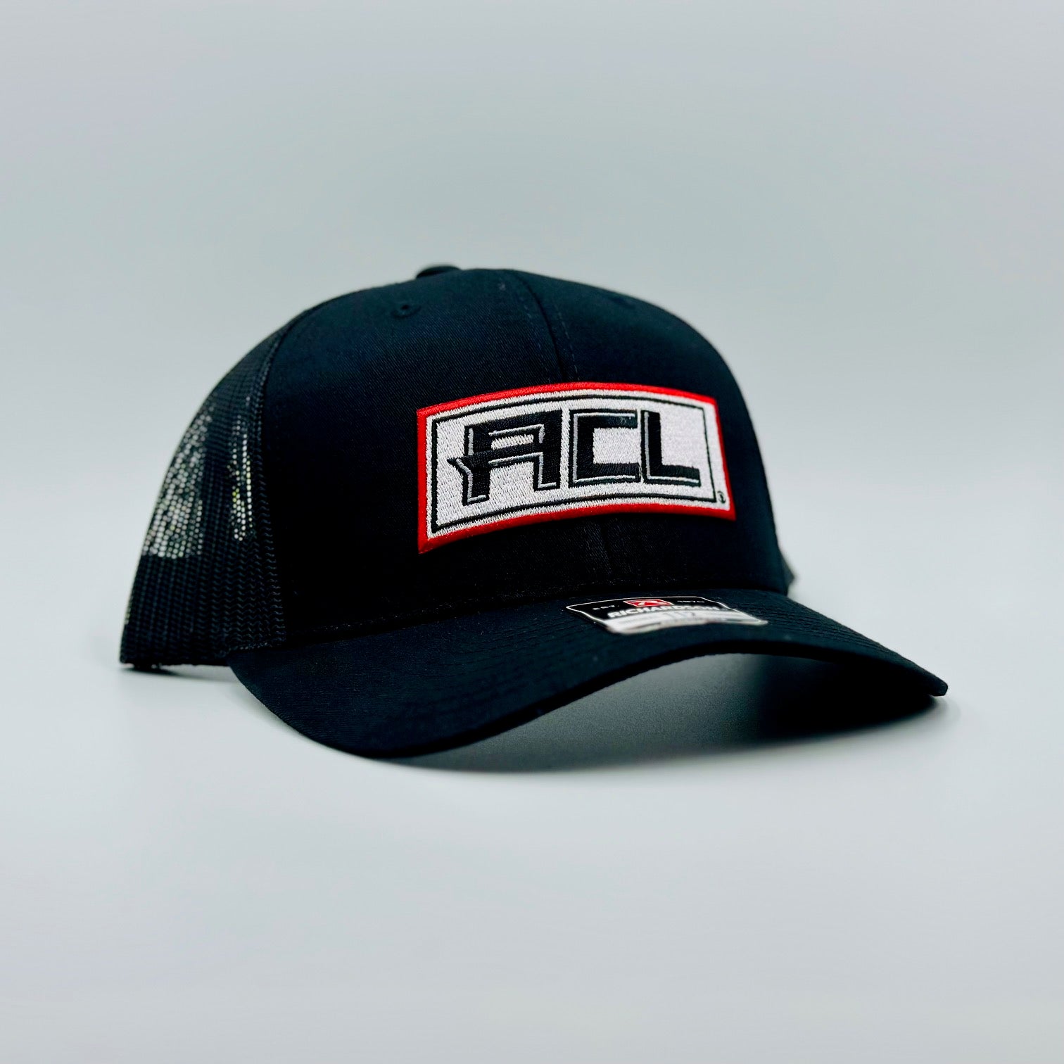 Black Flex Hat With Stitched Patch