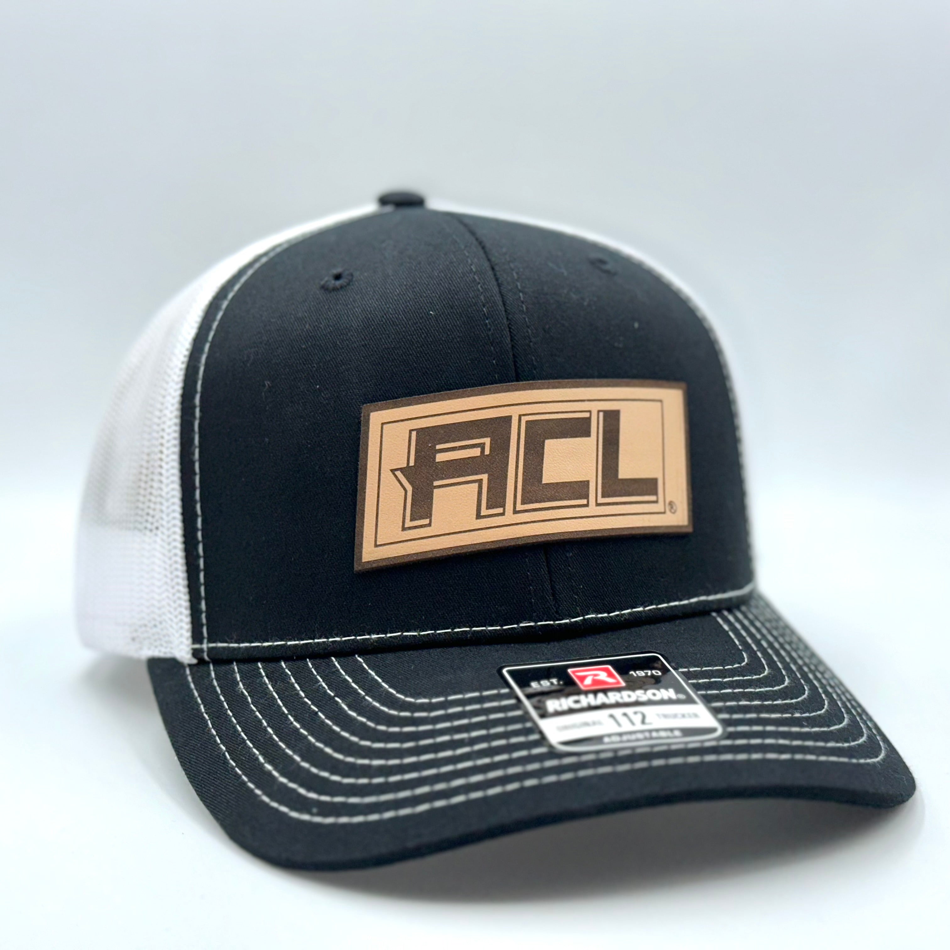 Black/White Hat With Leather Patch